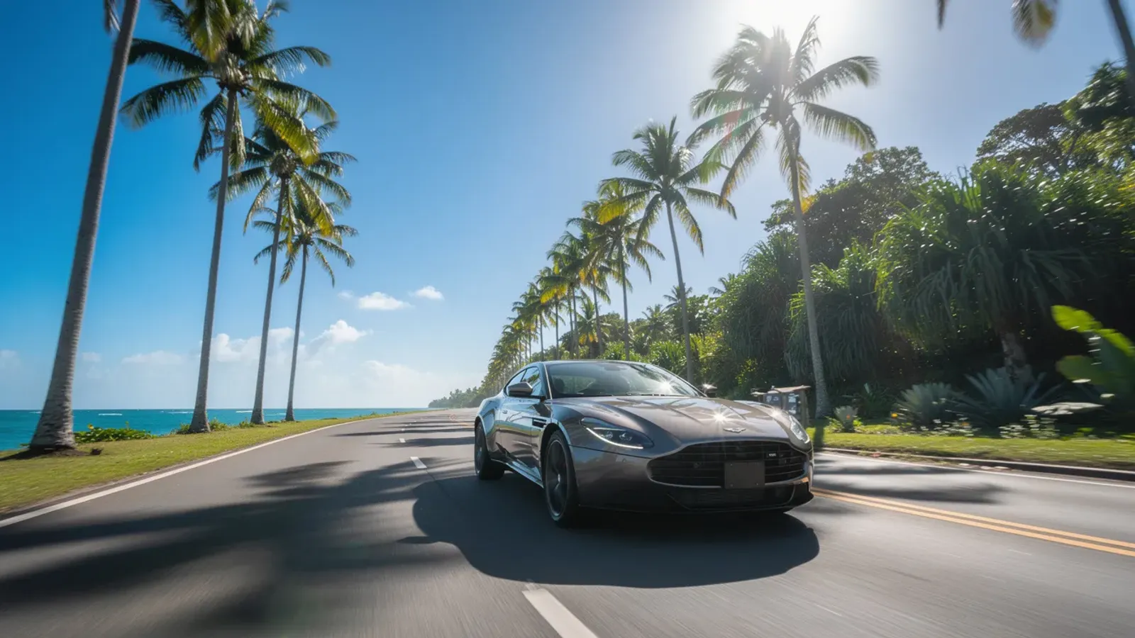 Sportowe auto na słonecznej nadmorskiej drodze wśród palm w Punta Cana